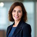 Portrait of Sarah Davies, a professional fleet manager in a modern office environment.